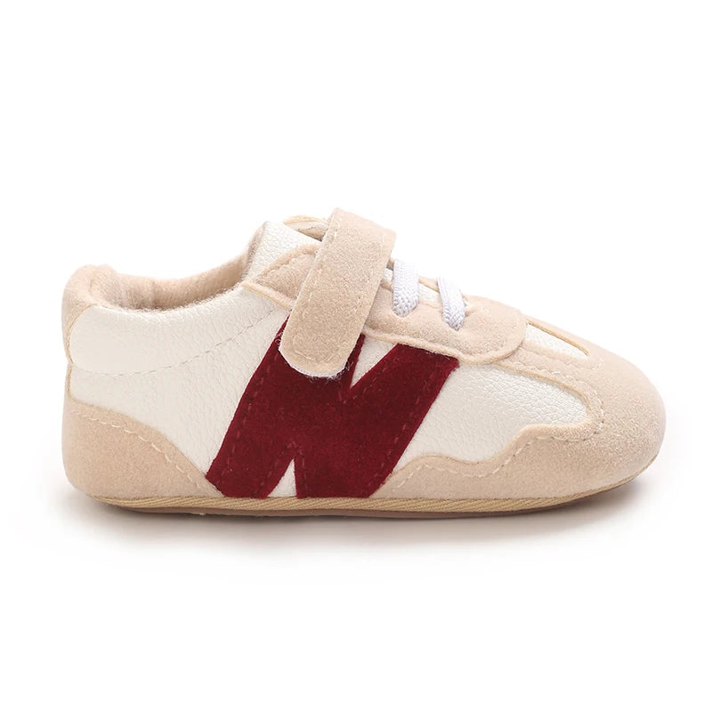Zapatillas clásicas para bebés recién nacidos con letras entrelazadas, calzado informal antideslizante para caminar, para niños y niñas de 0 a 18 meses