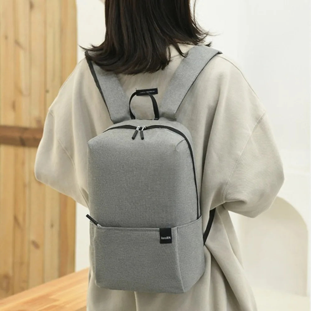 Portable Large Capacity Small Backpack Solid Color Waterproof Travel Bag Multiple Pockets Unisex School Bags Travel