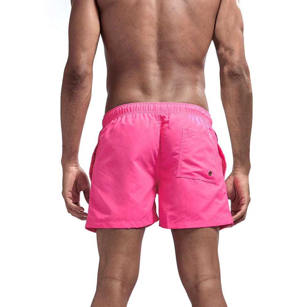 Bañador corto para hombre, de secado rápido, transpirable, con cordón y bolsillos para surfear en la playa en verano.