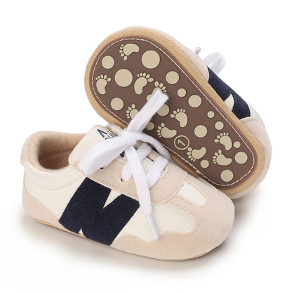 Zapatillas clásicas para bebés recién nacidos con letras entrelazadas, calzado informal antideslizante para caminar, para niños y niñas de 0 a 18 meses