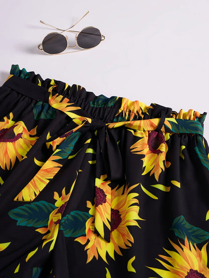 Pantalones cortos anchos con estampado de girasoles de talla grande, pantalones cortos casuales con cintura elástica para primavera y verano, ropa de talla grande para mujer.
