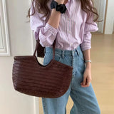 French Leather Woven Bag Fashion Simple Basket Bag Retro Advanced Handmade Bag New Versatile Commuting Women's Shoulder Handbag