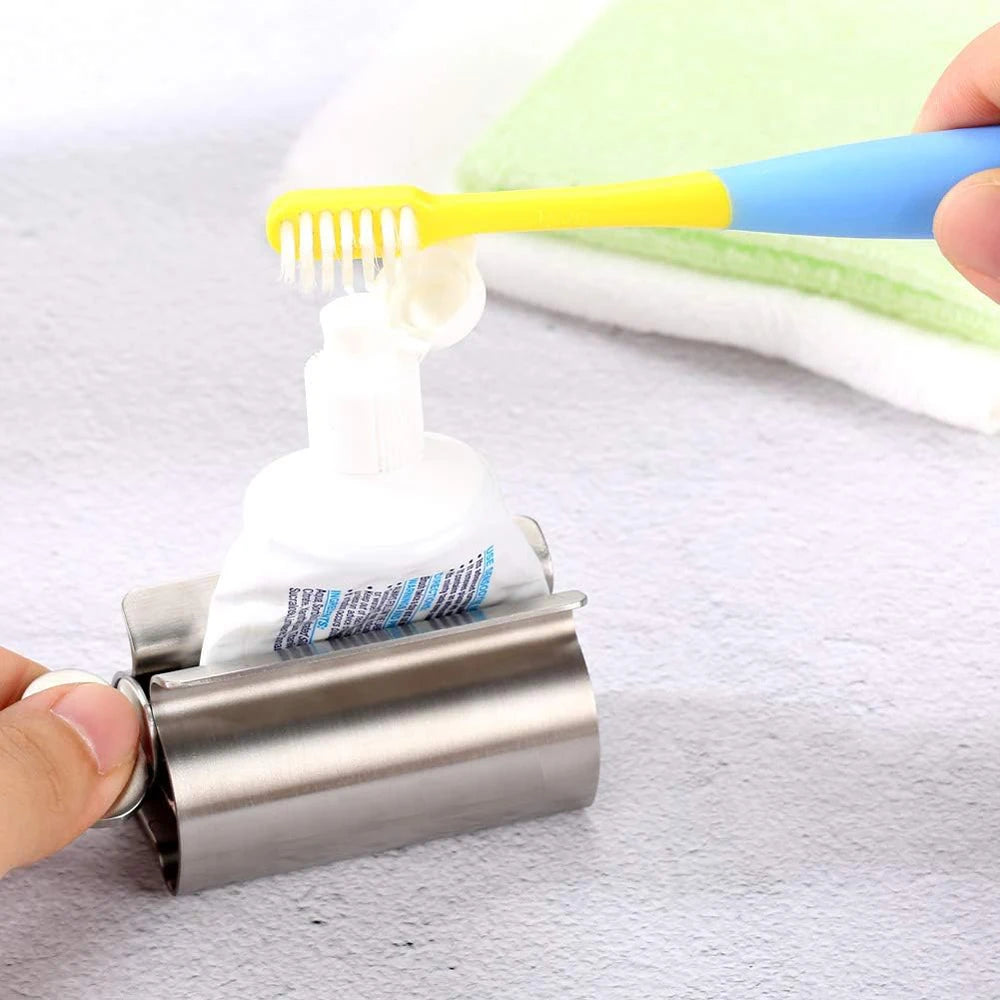 Accesorios de baño Exprimidor de pasta de dientes con rodillo de acero inoxidable, dispensador giratorio para ungüentos y cosméticos