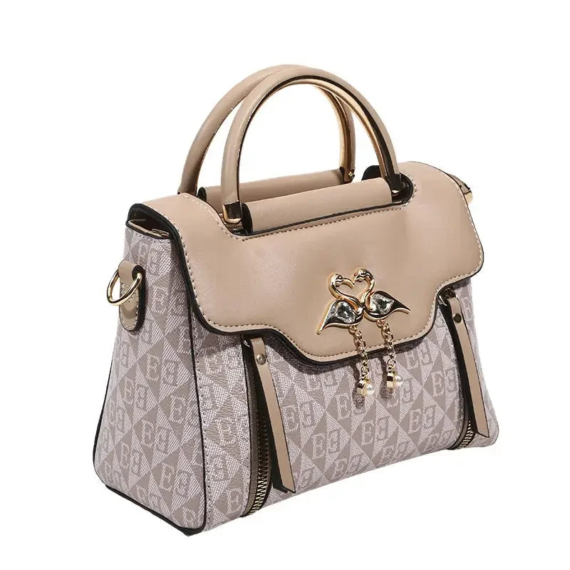 Ladies' handbag 2026 new fashion trend embossed plain style versatile casual shoulder crossbody bag.