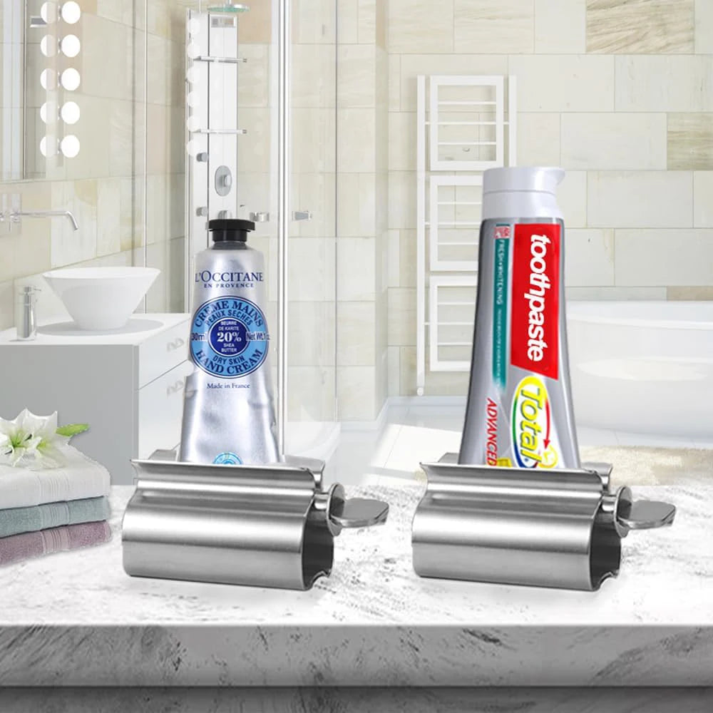 Accesorios de baño Exprimidor de pasta de dientes con rodillo de acero inoxidable, dispensador giratorio para ungüentos y cosméticos