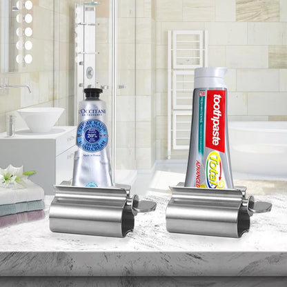 Accesorios de baño Exprimidor de pasta de dientes con rodillo de acero inoxidable, dispensador giratorio para ungüentos y cosméticos