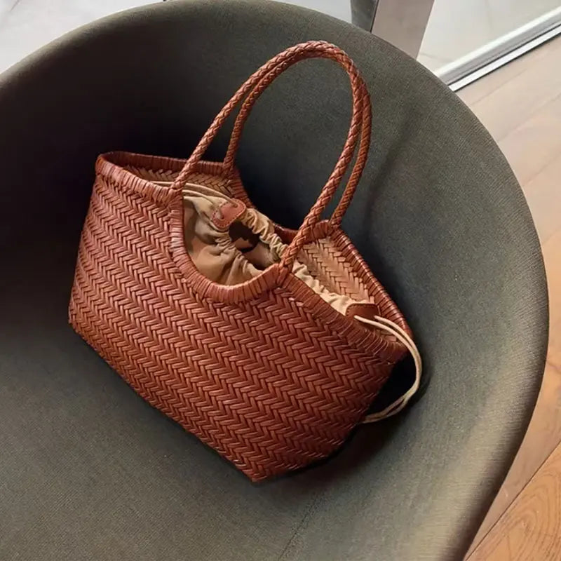 French Leather Woven Bag Fashion Simple Basket Bag Retro Advanced Handmade Bag New Versatile Commuting Women's Shoulder Handbag