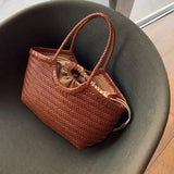 French Leather Woven Bag Fashion Simple Basket Bag Retro Advanced Handmade Bag New Versatile Commuting Women's Shoulder Handbag