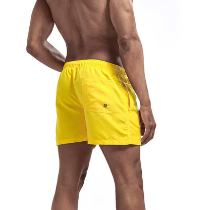 Bañador corto para hombre, de secado rápido, transpirable, con cordón y bolsillos para surfear en la playa en verano.