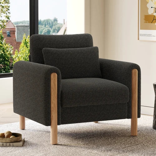 Modern armchair with thick cushions and a soft seat, suitable for reclining in the living room, office, or bedroom.