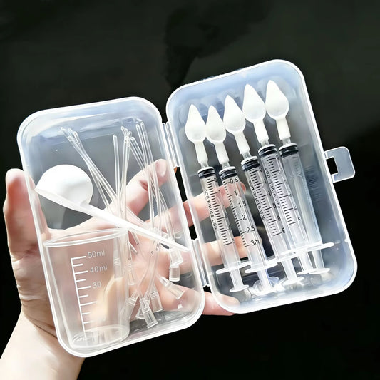 Bird medication feeding kit in a box, 10 feeding tubes, 5 syringes, 5 small spoons, 1 large spoon, measuring cup and box