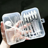 Bird medication feeding kit in a box, 10 feeding tubes, 5 syringes, 5 small spoons, 1 large spoon, measuring cup, and box