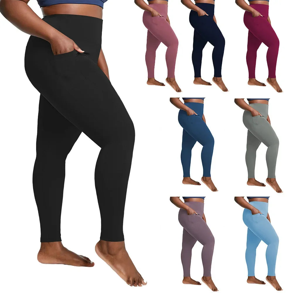 Pantalones deportivos de cintura alta de talla grande con bolsillos laterales dobles, cómodos para yoga y entrenamiento. 