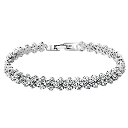 Pulsera elegante para mujer con cadena de circonitas cúbicas y brillantes incrustaciones. Regalos.