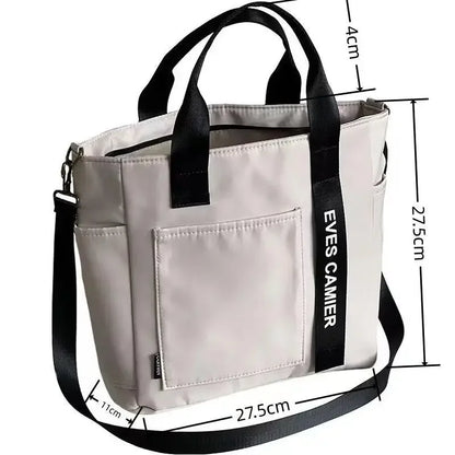 Nuevo bolso de hombro informal de gran capacidad, de nailon, impermeable, de lona, ​​sencillo y moderno, para colegiala.