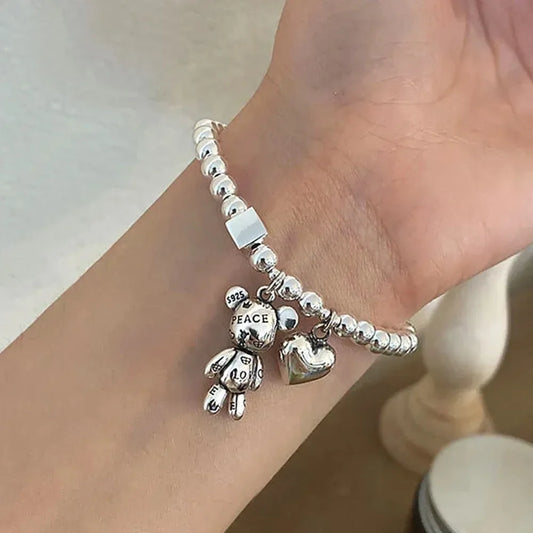 Nuevas pulseras de acero inoxidable para mujer, accesorios de moda con cuentas, pulsera con colgante de oso y corazón, joyería de fiesta de tendencia.