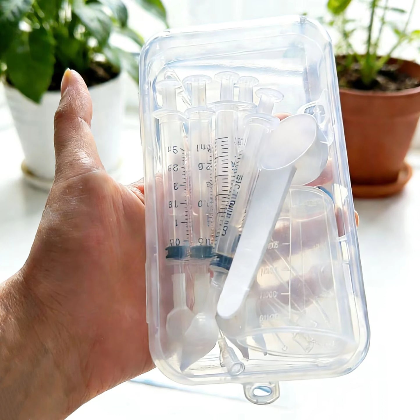 Bird medication feeding kit in a box, 10 feeding tubes, 5 syringes, 5 small spoons, 1 large spoon, measuring cup and box