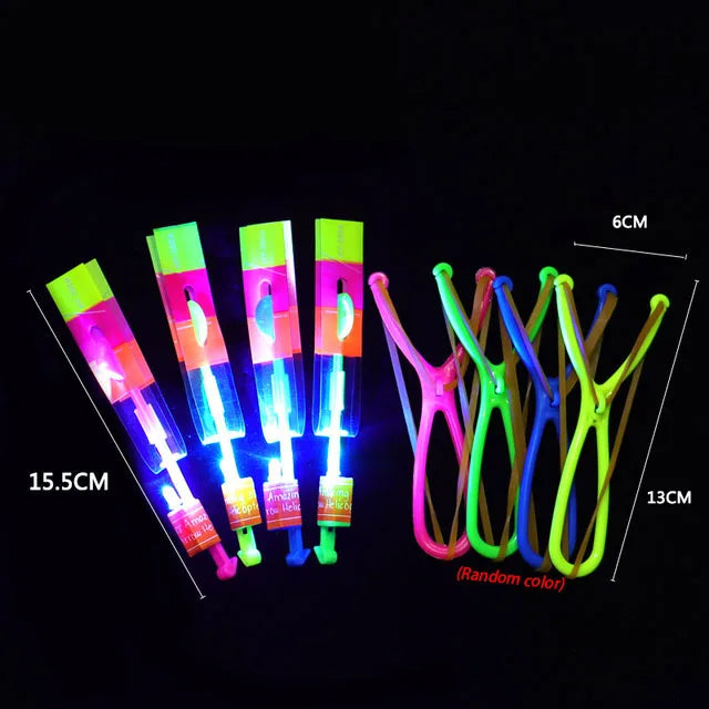 Increíble juguete luminoso, flecha LED, juguetes para fiestas al aire libre, divertido regalo, banda elástica, catapulta que brilla en la oscuridad, cohete, helicóptero, juguete volador.