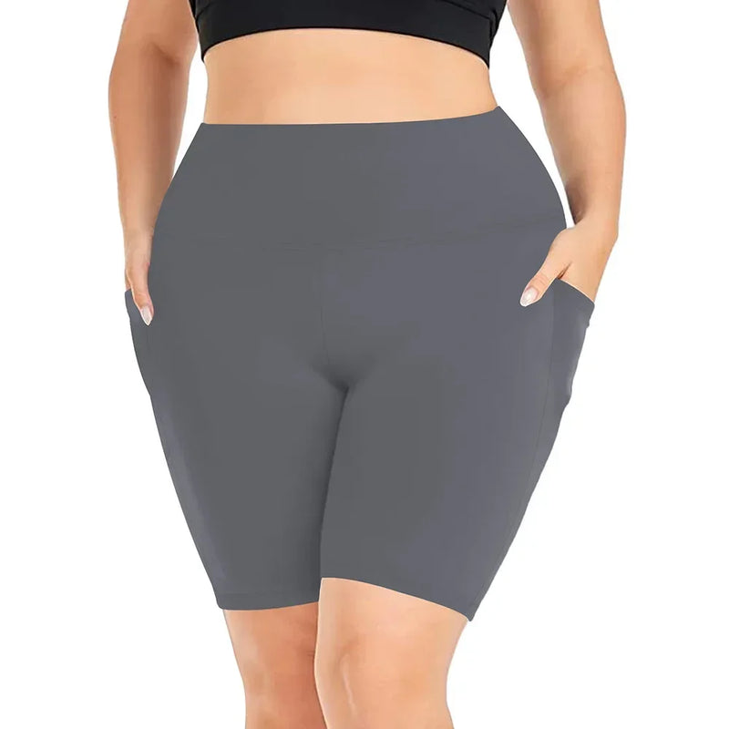 Pantalones cortos negros de talla grande para mujer, elegantes pantalones de yoga elásticos, leggings de tiro medio, perfectos para actividades al aire libre y fitness. 