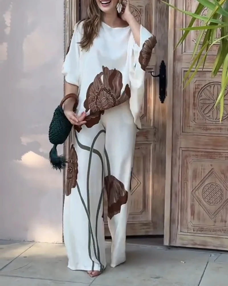 2-Piece Printed Slanted Neck Batwing Sleeve Top and Casual Loose Straight Leg Pants Set for Women's Summer Elegance 2-Piece Set