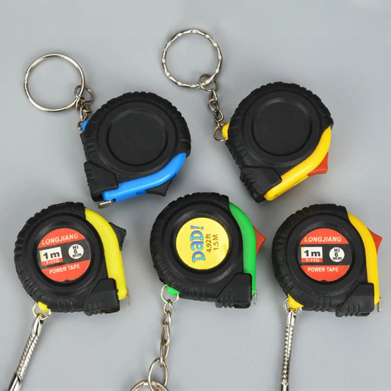 Mini llavero de cinta métrica eléctrica, regla de tracción Universal, cinta métrica retráctil, medidor de cinta métrica de 1m, herramienta de medida en pulgadas