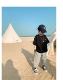 Camiseta de manga corta de verano para niños, Top de cuello redondo para niños pequeños y medianos, moda informal versátil de media manga