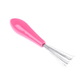 1 pieza de limpiador de cepillos de pelo con peine de color aleatorio, herramienta de limpieza de peine de plástico integrada.