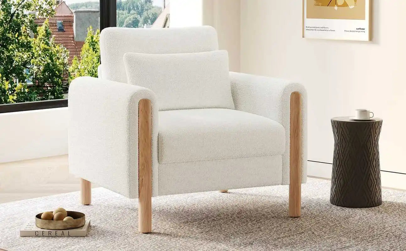 Modern armchair with thick cushions and a soft seat, suitable for reclining in the living room, office, or bedroom.