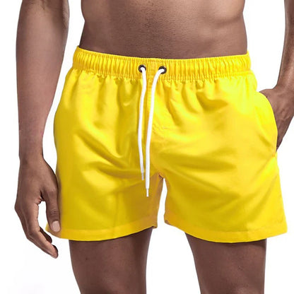 Bañador corto para hombre, de secado rápido, transpirable, con cordón y bolsillos para surfear en la playa en verano.