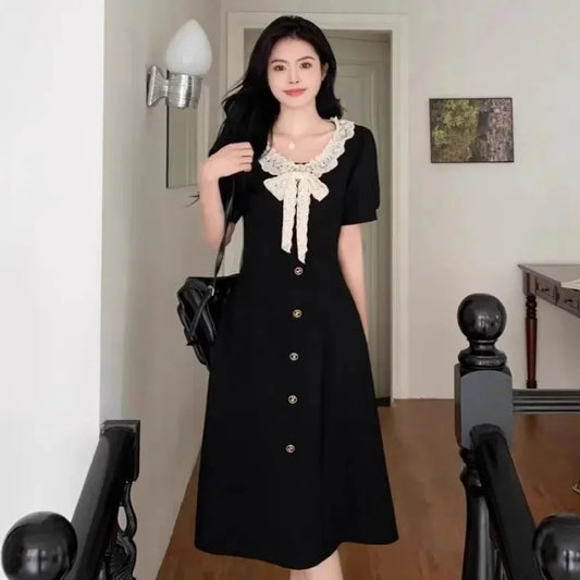 Vestido de verano adelgazante con cuello redondo y lazo vintage de talla grande para mujer, que disimula la figura con un diseño elegante. 