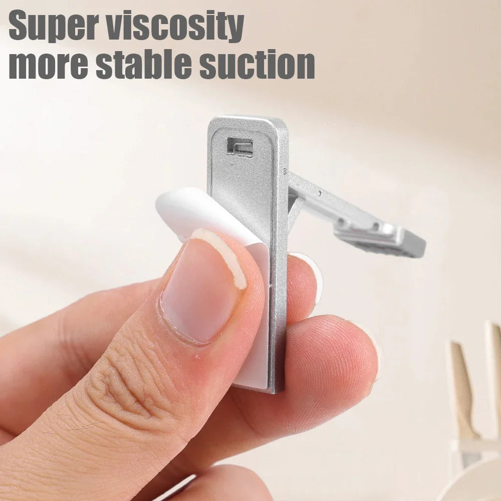 Mini soporte plegable ajustable de aleación de zinc para teléfono móvil, portátil, autoadhesivo, invisible.