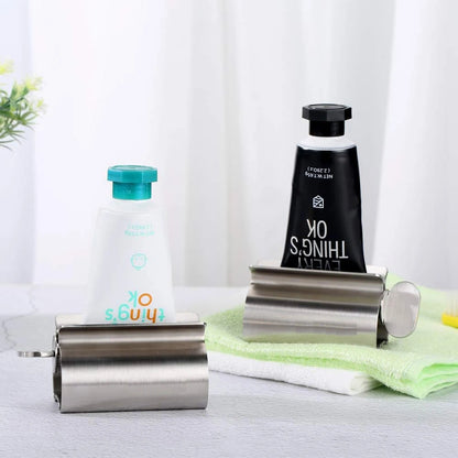 Accesorios de baño Exprimidor de pasta de dientes con rodillo de acero inoxidable, dispensador giratorio para ungüentos y cosméticos
