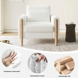 Modern armchair with thick cushions and a soft seat, suitable for reclining in the living room, office, or bedroom.