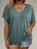 A new plous-size women's T-shirt with loose, perforated lace and solid V-neck short sleeves