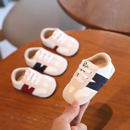 Zapatillas clásicas para bebés recién nacidos con letras entrelazadas, calzado informal antideslizante para caminar, para niños y niñas de 0 a 18 meses