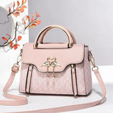 Ladies' handbag 2026 new fashion trend embossed plain style versatile casual shoulder crossbody bag.