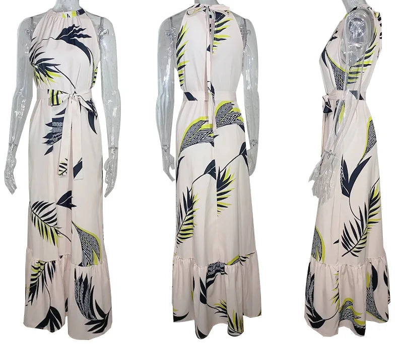 Vestido de verano para mujer, nuevo, sexy, sin mangas, con cuello colgante y cordones en la cintura, falda a la moda con estampado de hojas de loto, largo hasta el suelo.