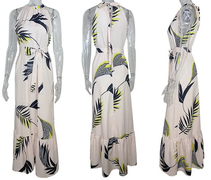 Vestido de verano para mujer, nuevo, sexy, sin mangas, con cuello colgante y cordones en la cintura, falda a la moda con estampado de hojas de loto, largo hasta el suelo.