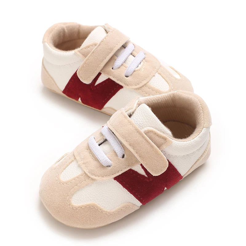 Zapatillas clásicas para bebés recién nacidos con letras entrelazadas, calzado informal antideslizante para caminar, para niños y niñas de 0 a 18 meses