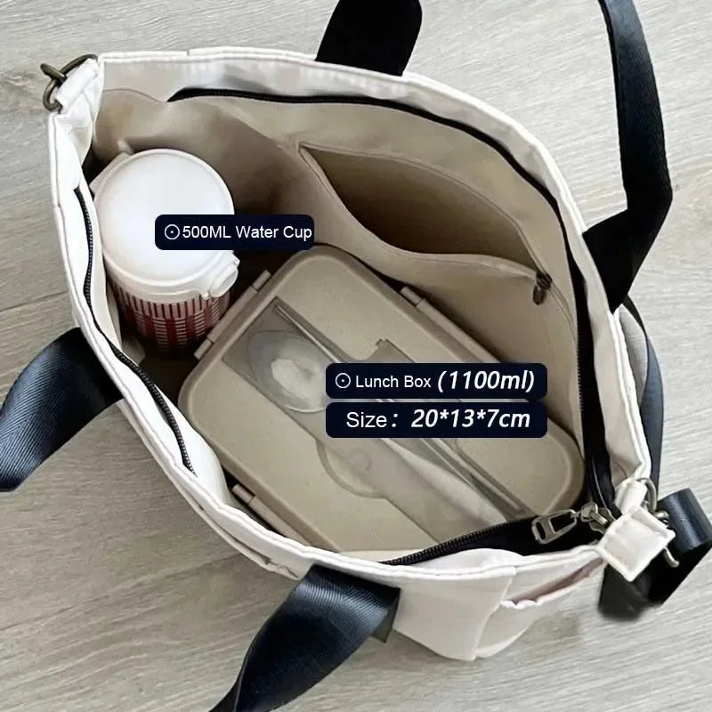Nuevo bolso de hombro informal de gran capacidad, de nailon, impermeable, de lona, ​​sencillo y moderno, para colegiala.