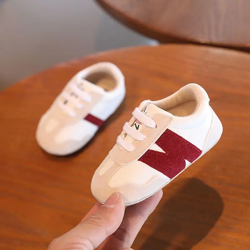 Zapatillas clásicas para bebés recién nacidos con letras entrelazadas, calzado informal antideslizante para caminar, para niños y niñas de 0 a 18 meses