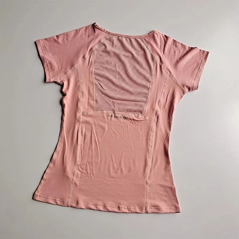 Camiseta deportiva de manga corta para mujer, cuello redondo, malla transpirable de secado rápido para yoga y fitness. 