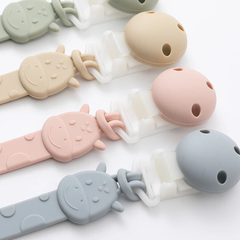 Portachupetes de silicona para bebés de 3 meses o más, sin BPA, diseño de una sola pieza. 