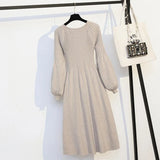 Vestido de talla grande para cubrir la barriga, largo medio a largo, suéter de punto, falda larga sencilla y versátil, otoño e invierno. 