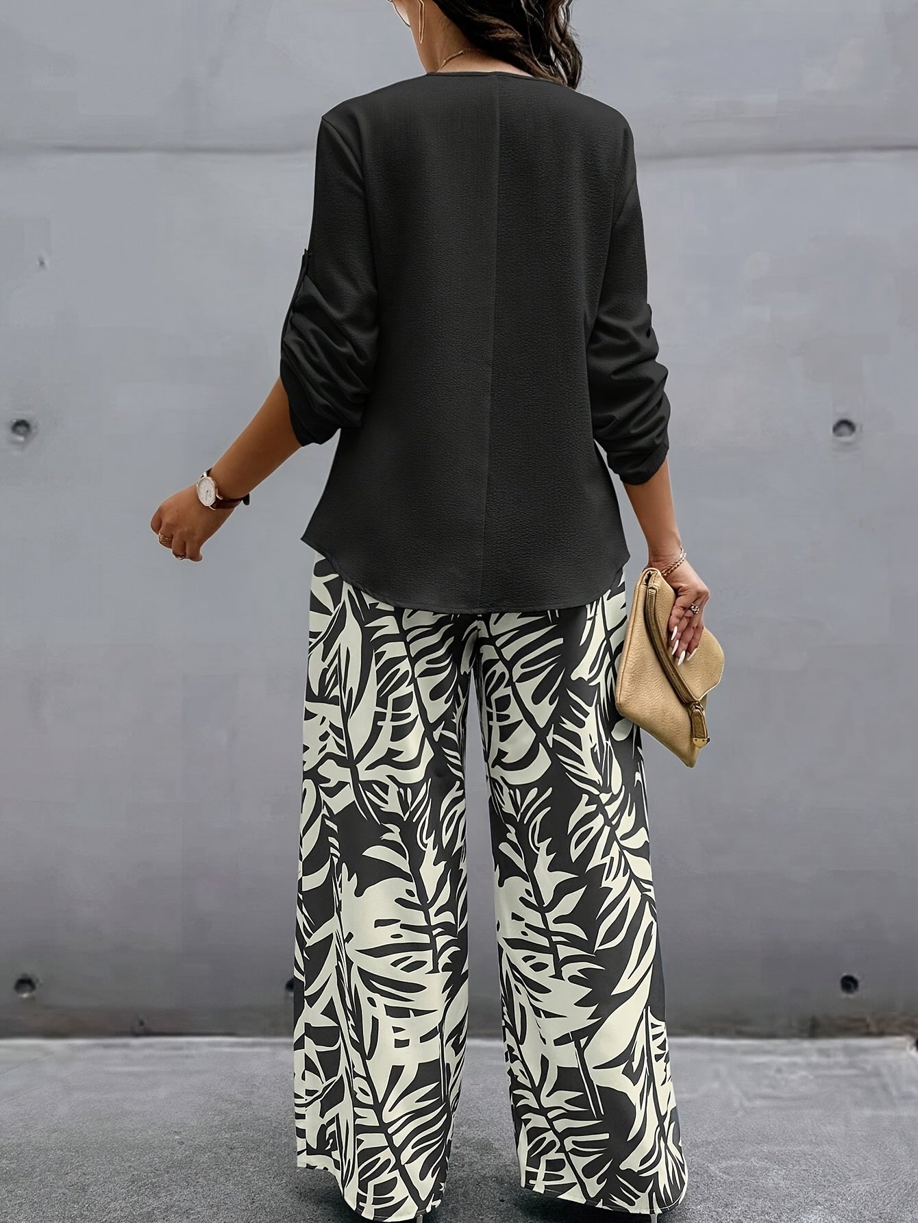 Conjunto de top y pantalón de manga larga con diseño elegante de primavera-verano