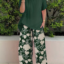 Plus Size Elegant Two-piece Set, Solid Crew Neck Short Sleeve Top & Floral Print Pants Outfits, Women's Plus Size Clothing