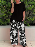Plus Size Elegant Two-piece Set, Solid Crew Neck Short Sleeve Top & Floral Print Pants Outfits, Women's Plus Size Clothing