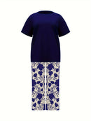 Plus Size Elegant Two-piece Set, Solid Crew Neck Short Sleeve Top & Floral Print Pants Outfits, Women's Plus Size Clothing
